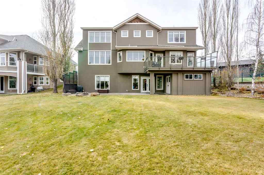 MLS® A2268978 - 311 Rodeo Ridge  in Springbank Links Rural Rocky View County, Residential