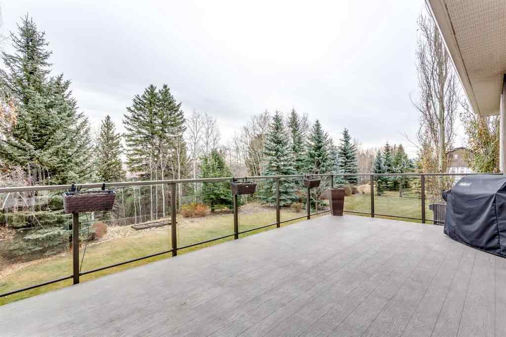 MLS® A2268978 - 311 Rodeo Ridge  in Springbank Links Rural Rocky View County, Residential