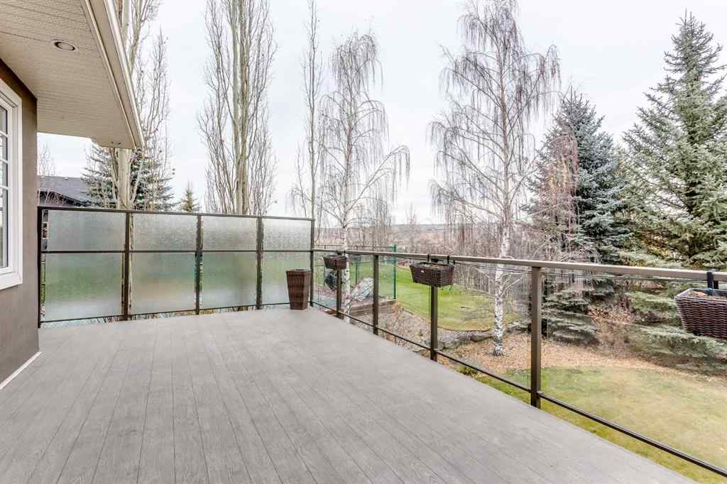 MLS® A2268978 - 311 Rodeo Ridge  in Springbank Links Rural Rocky View County, Residential