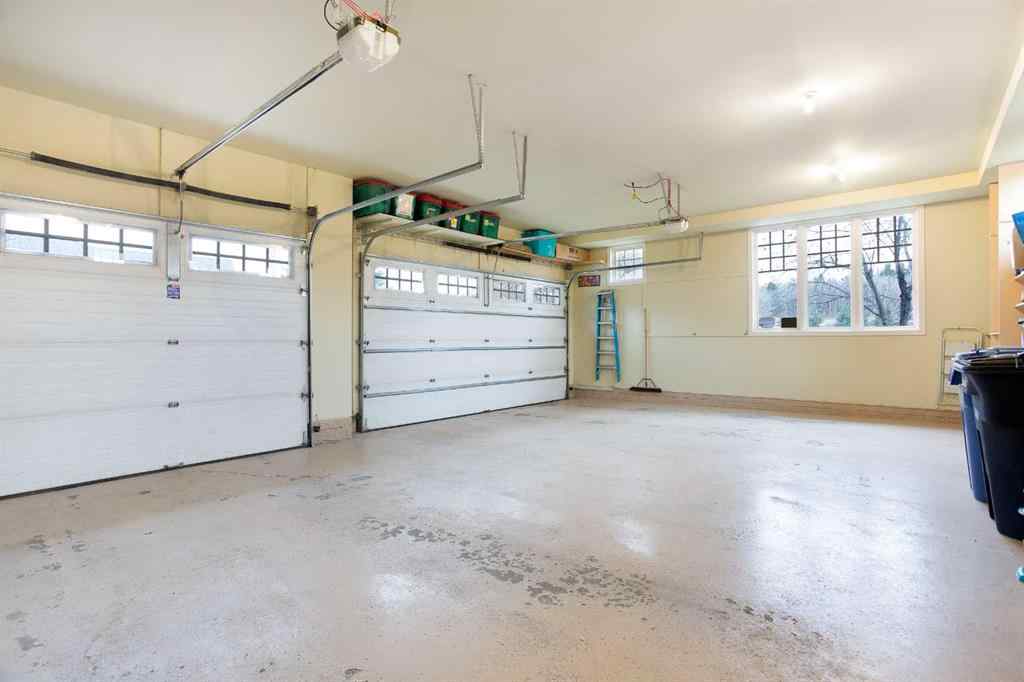 MLS® A2268978 - 311 Rodeo Ridge  in Springbank Links Rural Rocky View County, Residential