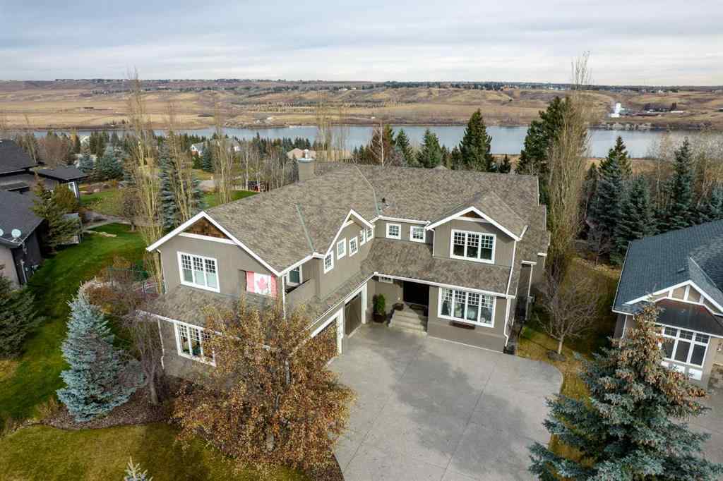 MLS® A2268978 - 311 Rodeo Ridge  in Springbank Links Rural Rocky View County, Residential