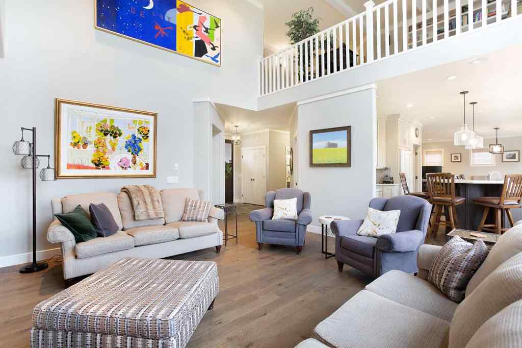 MLS® A2268978 - 311 Rodeo Ridge  in Springbank Links Rural Rocky View County, Residential