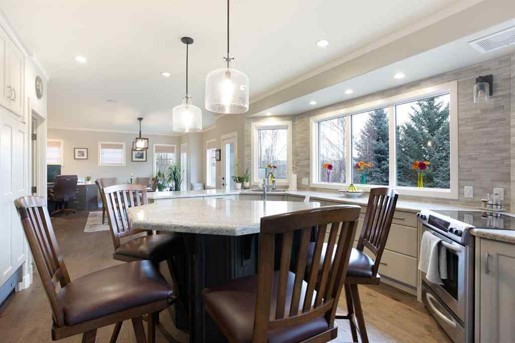 MLS® A2268978 - 311 Rodeo Ridge  in Springbank Links Rural Rocky View County, Residential