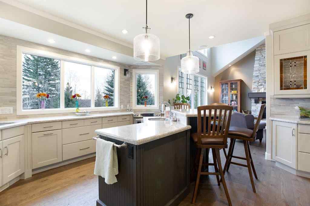 MLS® A2268978 - 311 Rodeo Ridge  in Springbank Links Rural Rocky View County, Residential