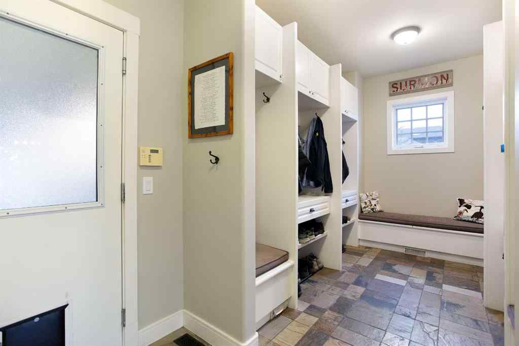 MLS® A2268978 - 311 Rodeo Ridge  in Springbank Links Rural Rocky View County, Residential