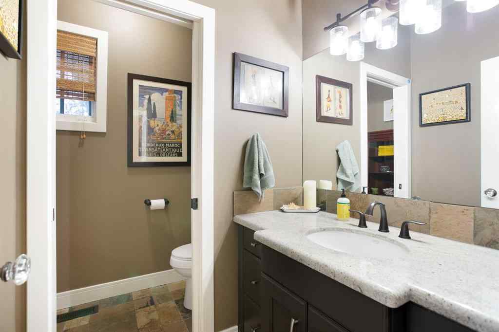 MLS® A2268978 - 311 Rodeo Ridge  in Springbank Links Rural Rocky View County, Residential