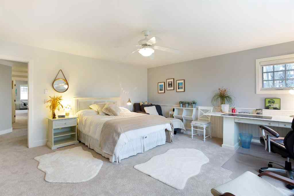 MLS® A2268978 - 311 Rodeo Ridge  in Springbank Links Rural Rocky View County, Residential