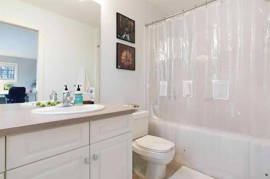 MLS® A2268978 - 311 Rodeo Ridge  in Springbank Links Rural Rocky View County, Residential