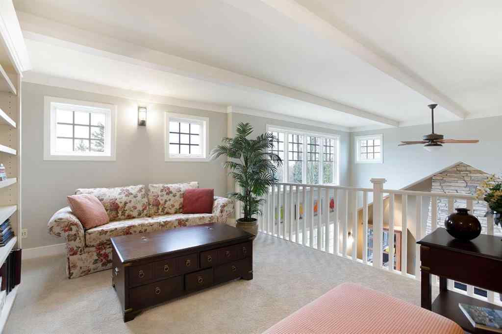 MLS® A2268978 - 311 Rodeo Ridge  in Springbank Links Rural Rocky View County, Residential