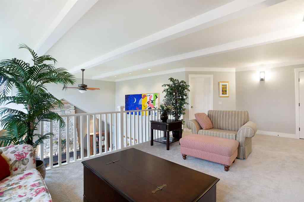 MLS® A2268978 - 311 Rodeo Ridge  in Springbank Links Rural Rocky View County, Residential