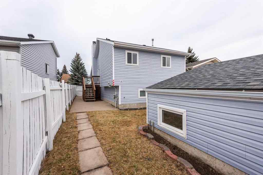 MLS® A2268981 - 115 Shawglen Way SW in Shawnessy Calgary, Residential