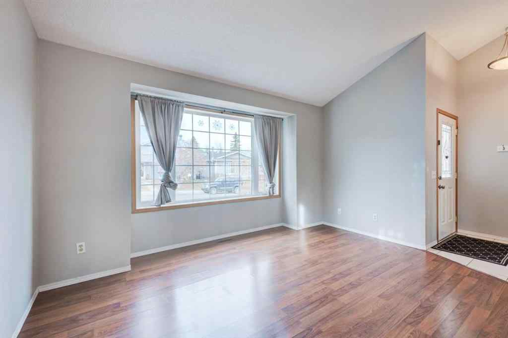 MLS® A2268981 - 115 Shawglen Way SW in Shawnessy Calgary, Residential