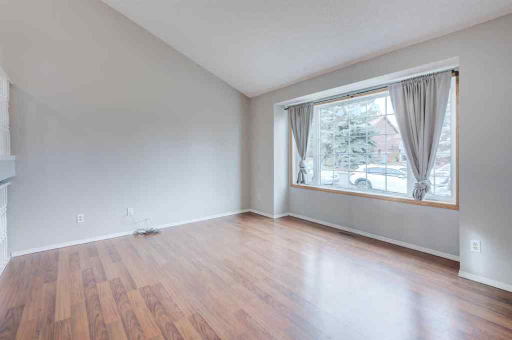 MLS® A2268981 - 115 Shawglen Way SW in Shawnessy Calgary, Residential