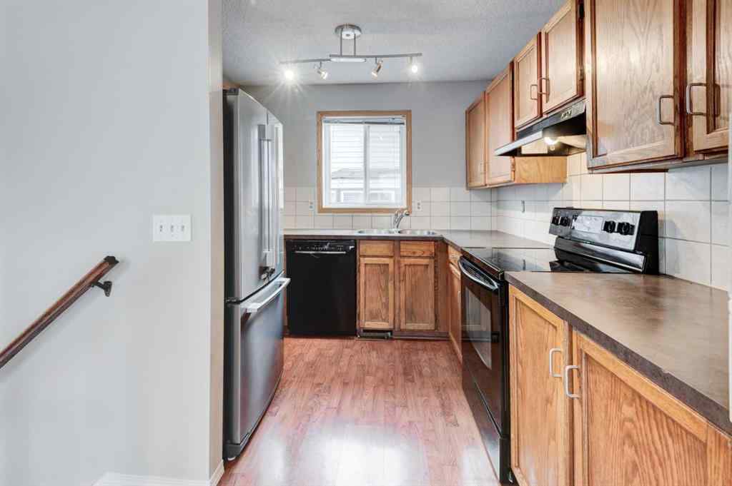 MLS® A2268981 - 115 Shawglen Way SW in Shawnessy Calgary, Residential