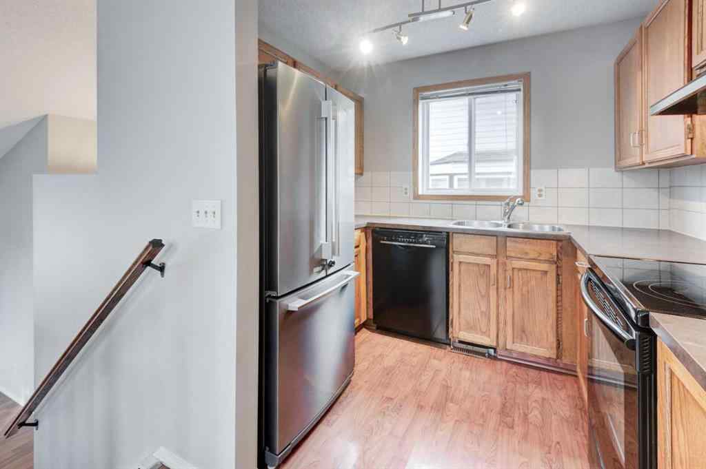 MLS® A2268981 - 115 Shawglen Way SW in Shawnessy Calgary, Residential