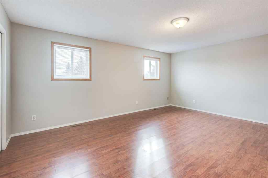 MLS® A2268981 - 115 Shawglen Way SW in Shawnessy Calgary, Residential