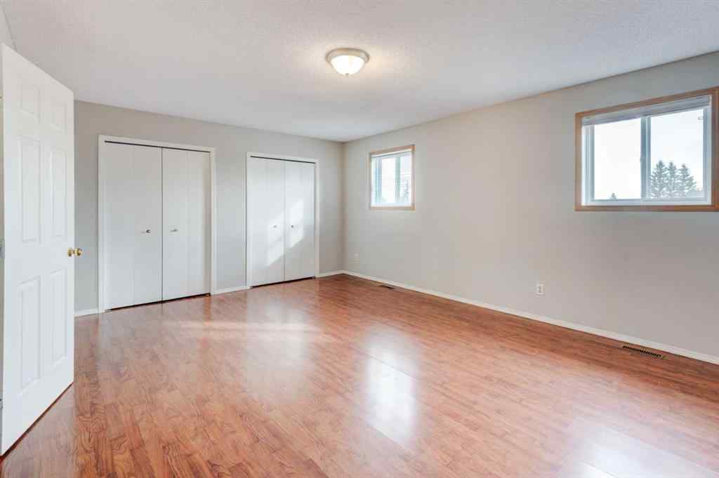 MLS® A2268981 - 115 Shawglen Way SW in Shawnessy Calgary, Residential