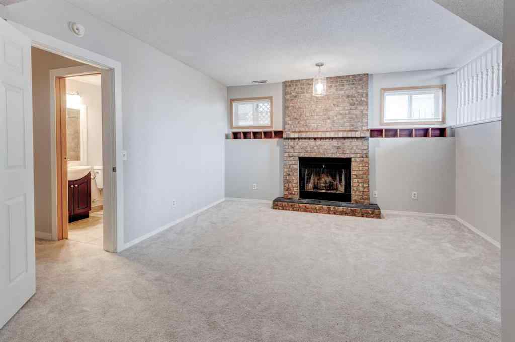 MLS® A2268981 - 115 Shawglen Way SW in Shawnessy Calgary, Residential