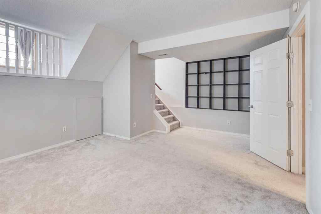 MLS® A2268981 - 115 Shawglen Way SW in Shawnessy Calgary, Residential