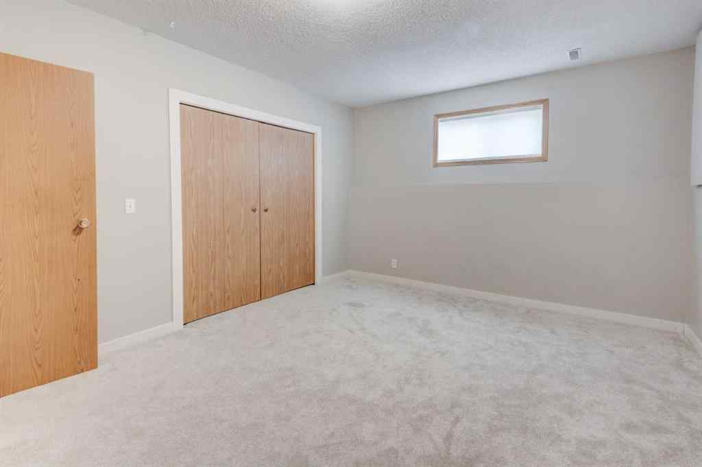 MLS® A2268981 - 115 Shawglen Way SW in Shawnessy Calgary, Residential