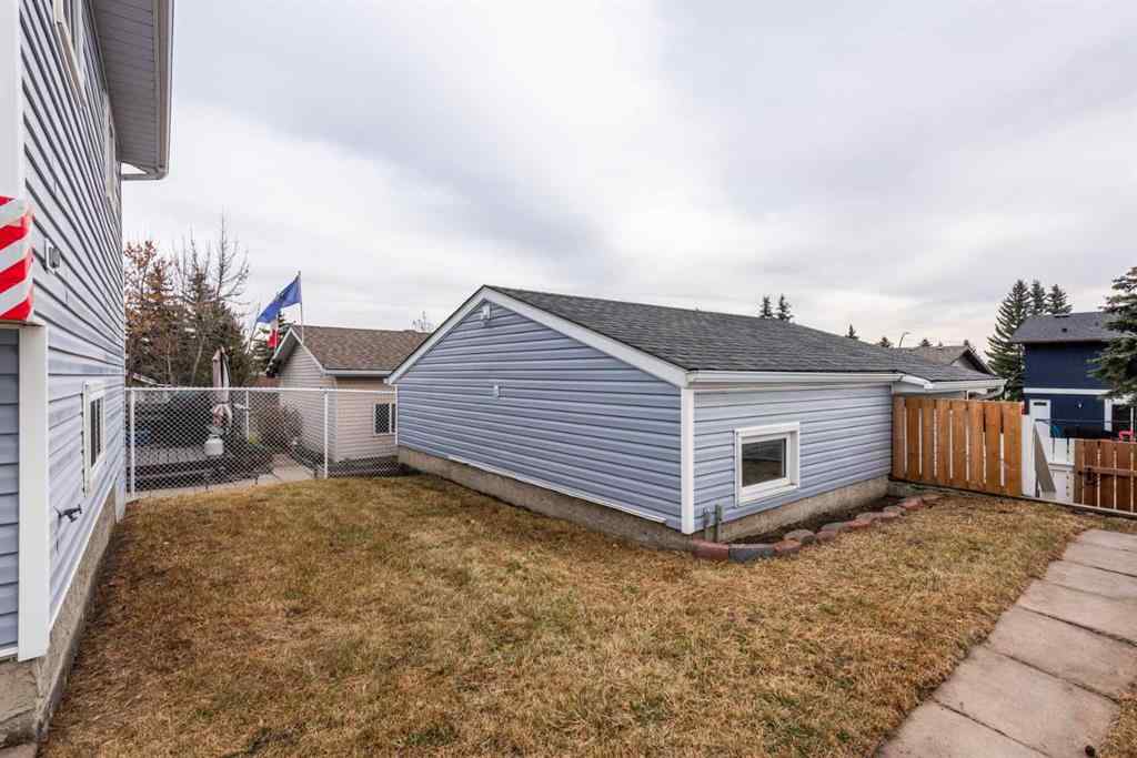 MLS® A2268981 - 115 Shawglen Way SW in Shawnessy Calgary, Residential