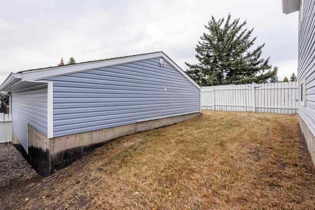 MLS® A2268981 - 115 Shawglen Way SW in Shawnessy Calgary, Residential