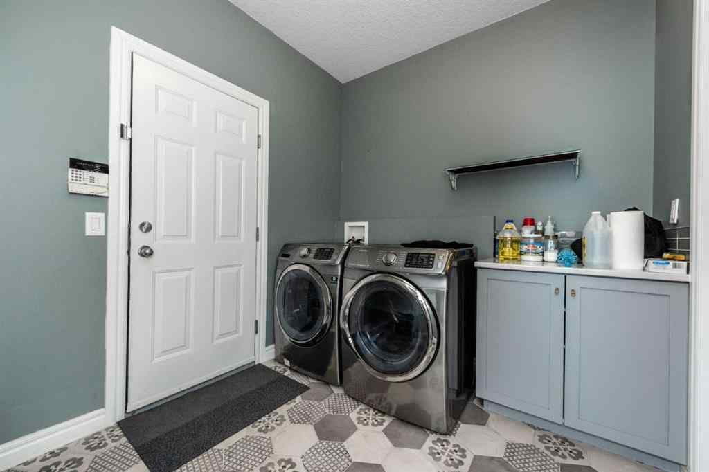 MLS® A2268985 - 66 Wentworth Road SW in West Springs Calgary, Residential