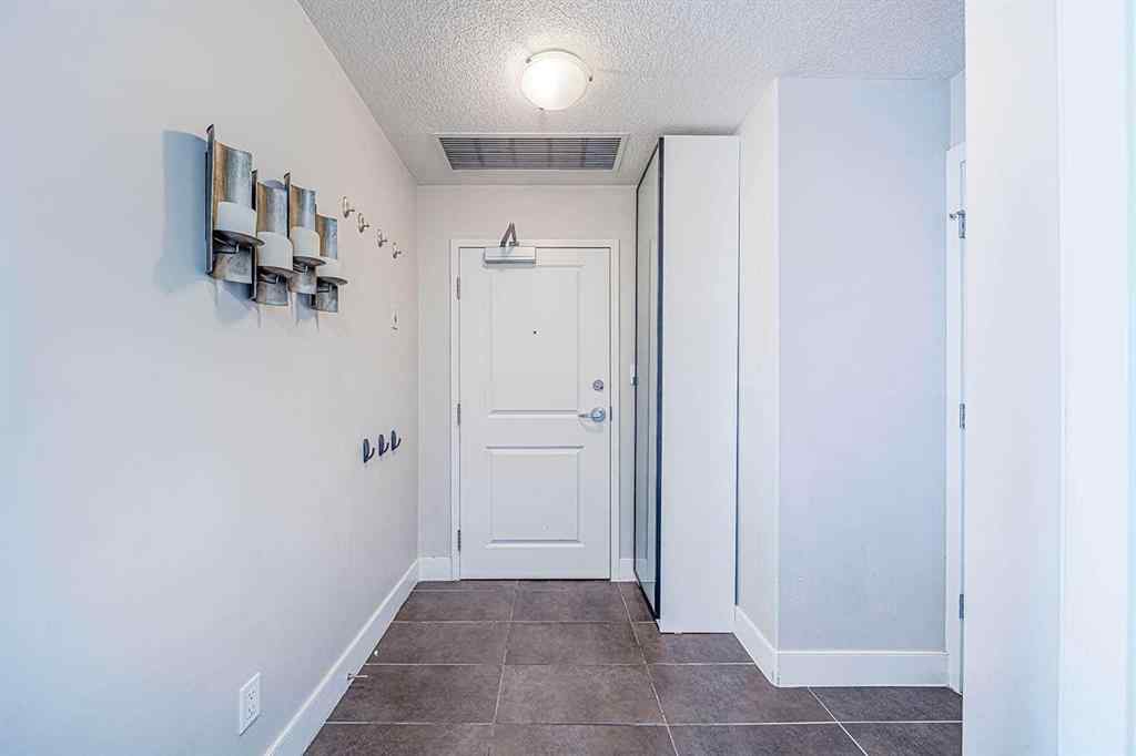 MLS&reg; # A2268996 - Unit #707 77 Spruce Place SW in Spruce Cliff Calgary, Residential Open Houses