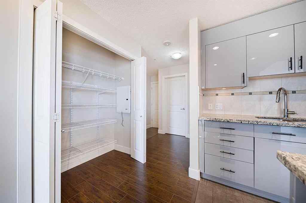 MLS&reg; # A2268996 - Unit #707 77 Spruce Place SW in Spruce Cliff Calgary, Residential Open Houses