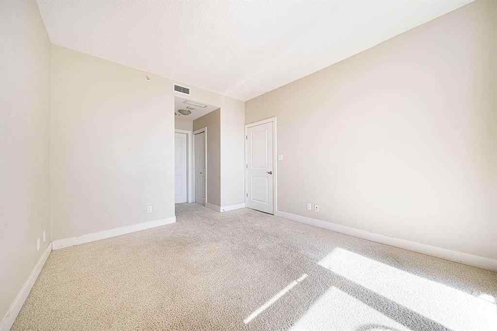 MLS&reg; # A2268996 - Unit #707 77 Spruce Place SW in Spruce Cliff Calgary, Residential Open Houses