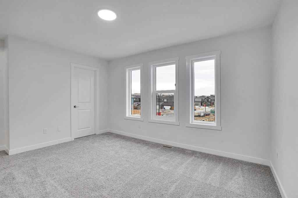 MLS® A2268998 - 178 Belmont Street SW in Belmont Calgary, Residential