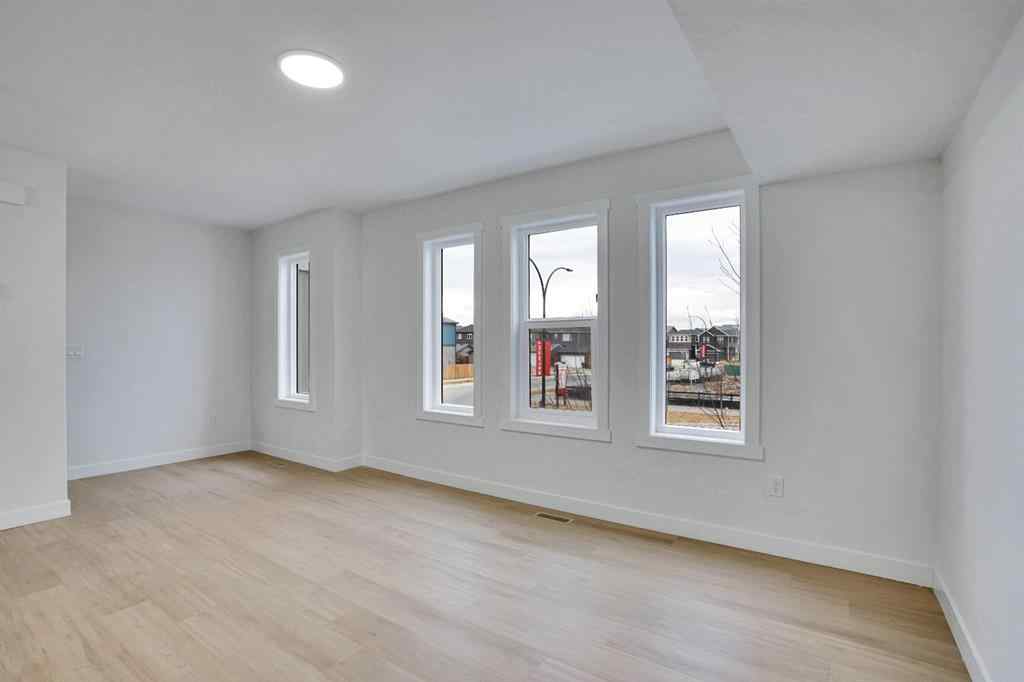 MLS® A2268998 - 178 Belmont Street SW in Belmont Calgary, Residential