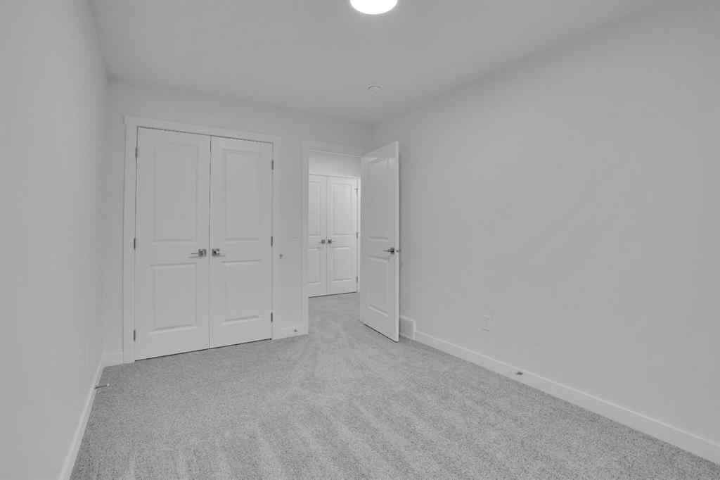 MLS® A2269005 - 186 Belmont Street SW in Belmont Calgary, Residential