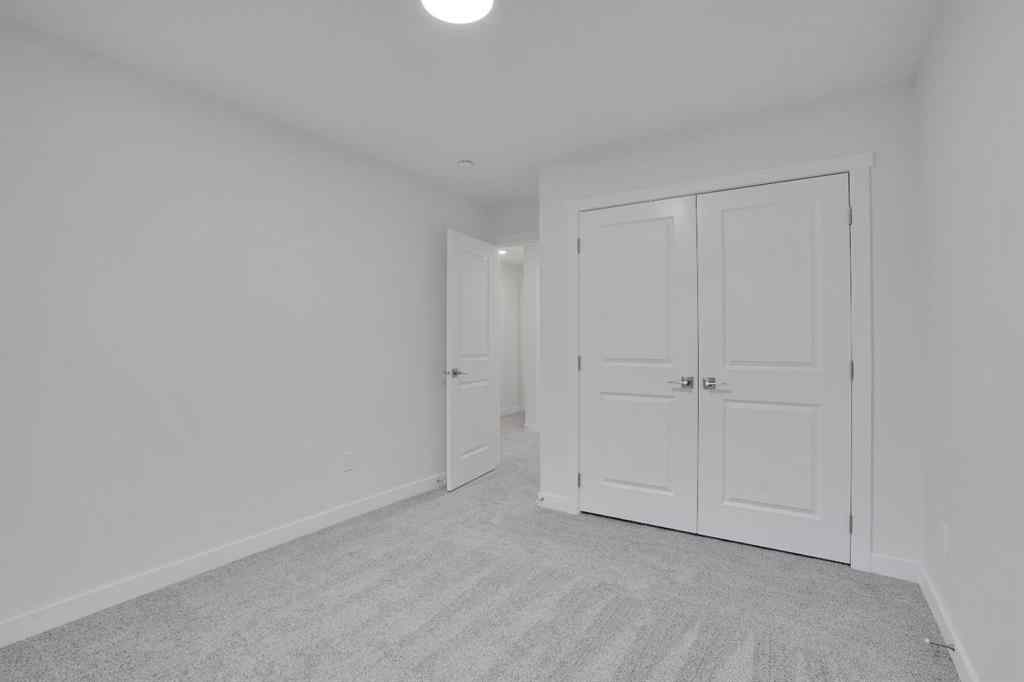 MLS® A2269005 - 186 Belmont Street SW in Belmont Calgary, Residential