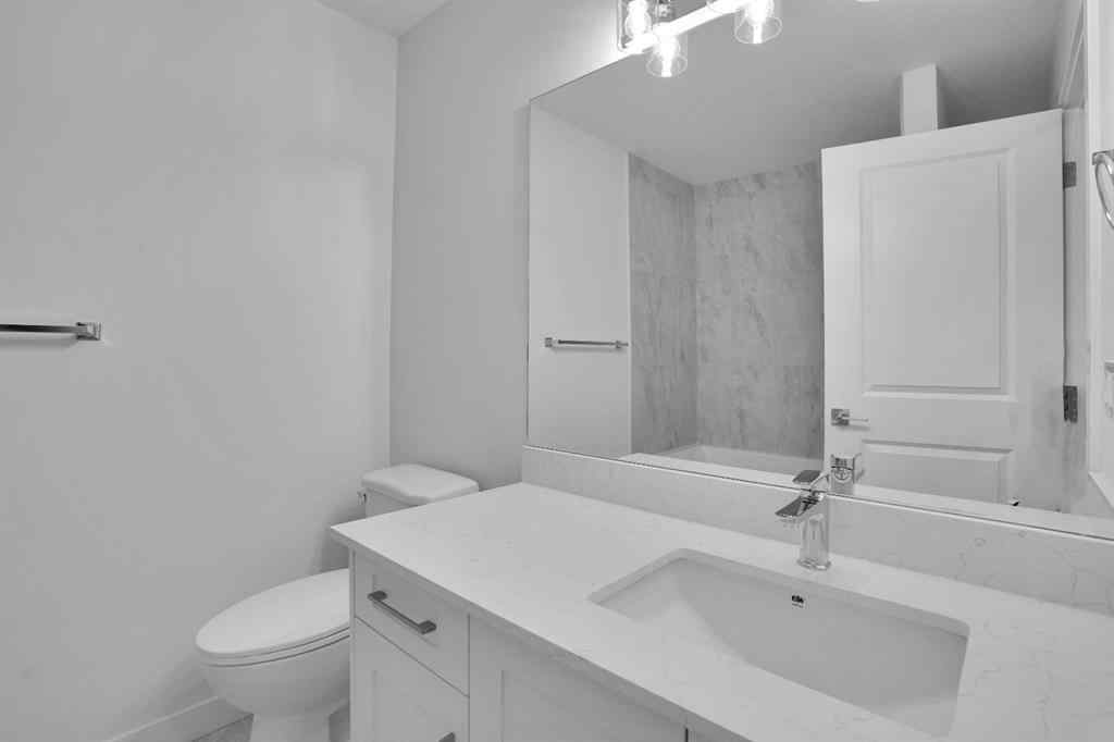 MLS® A2269005 - 186 Belmont Street SW in Belmont Calgary, Residential