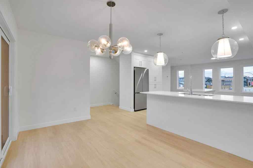 MLS® A2269005 - 186 Belmont Street SW in Belmont Calgary, Residential