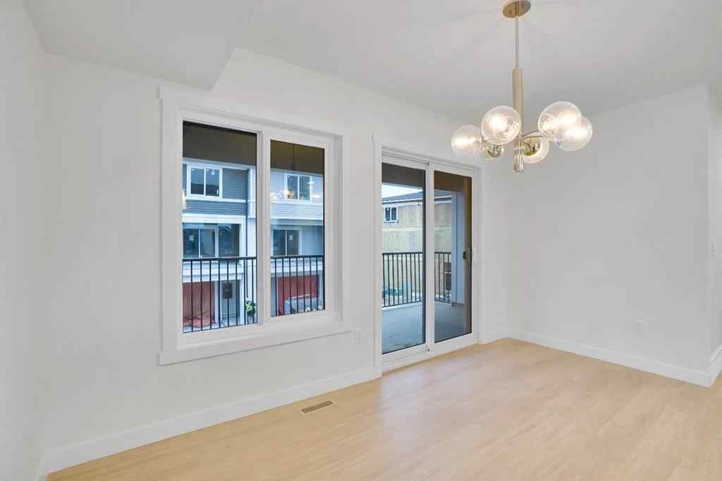 MLS® A2269005 - 186 Belmont Street SW in Belmont Calgary, Residential