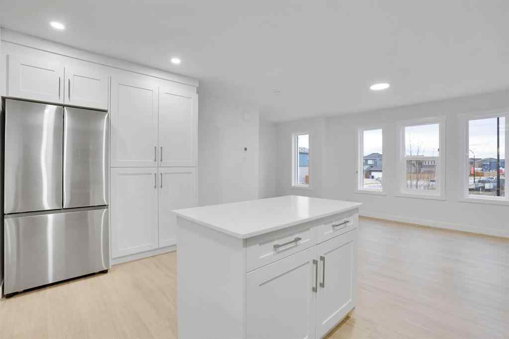 MLS® A2269005 - 186 Belmont Street SW in Belmont Calgary, Residential