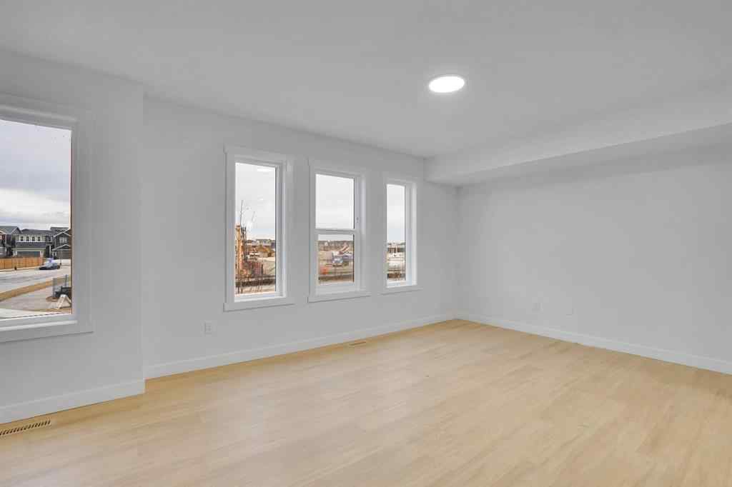 MLS® A2269005 - 186 Belmont Street SW in Belmont Calgary, Residential