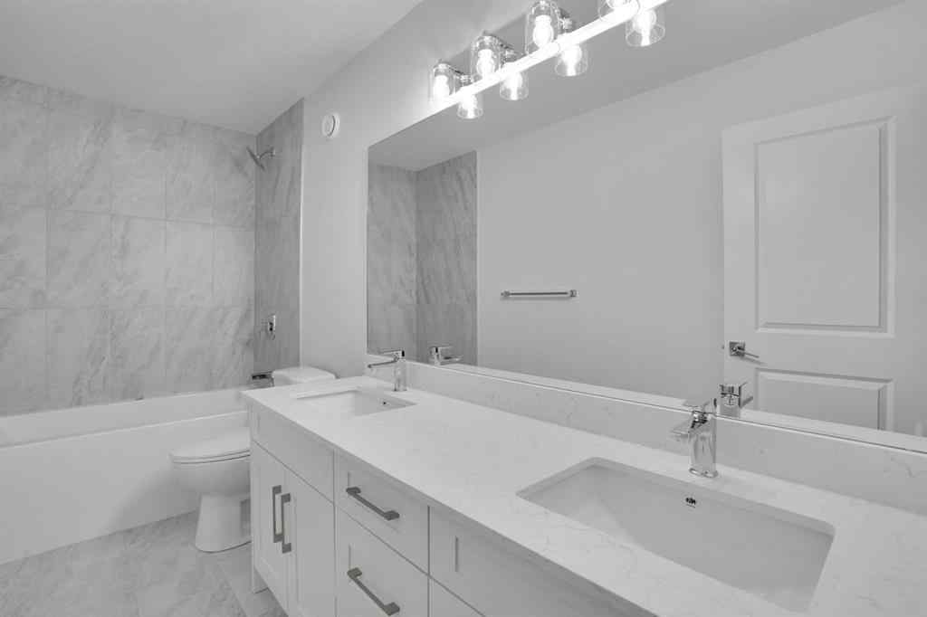 MLS® A2269005 - 186 Belmont Street SW in Belmont Calgary, Residential