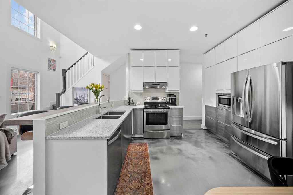 MLS&reg; # A2269008 - Unit #103 916 19 Avenue SW in Lower Mount Royal Calgary, Residential Open Houses