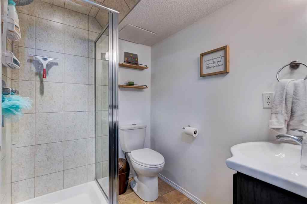 MLS® A2269029 - 235 Strathearn Crescent SW in Strathcona Park Calgary, Residential