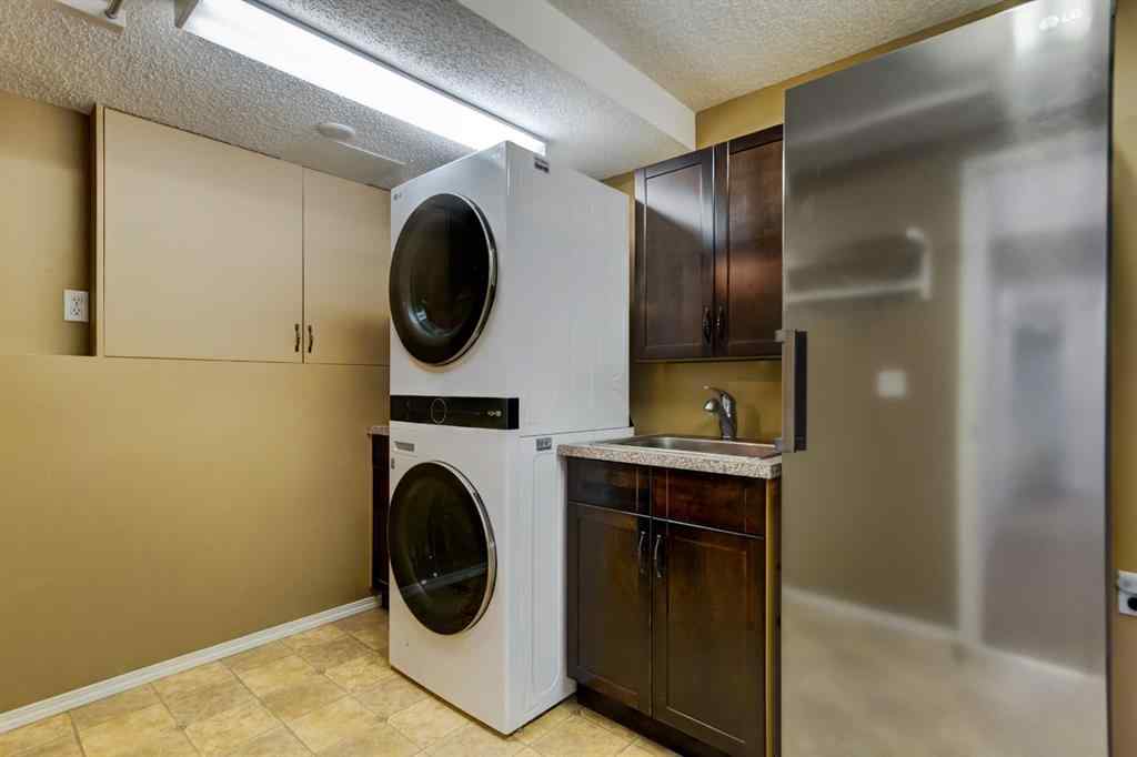 MLS® A2269029 - 235 Strathearn Crescent SW in Strathcona Park Calgary, Residential