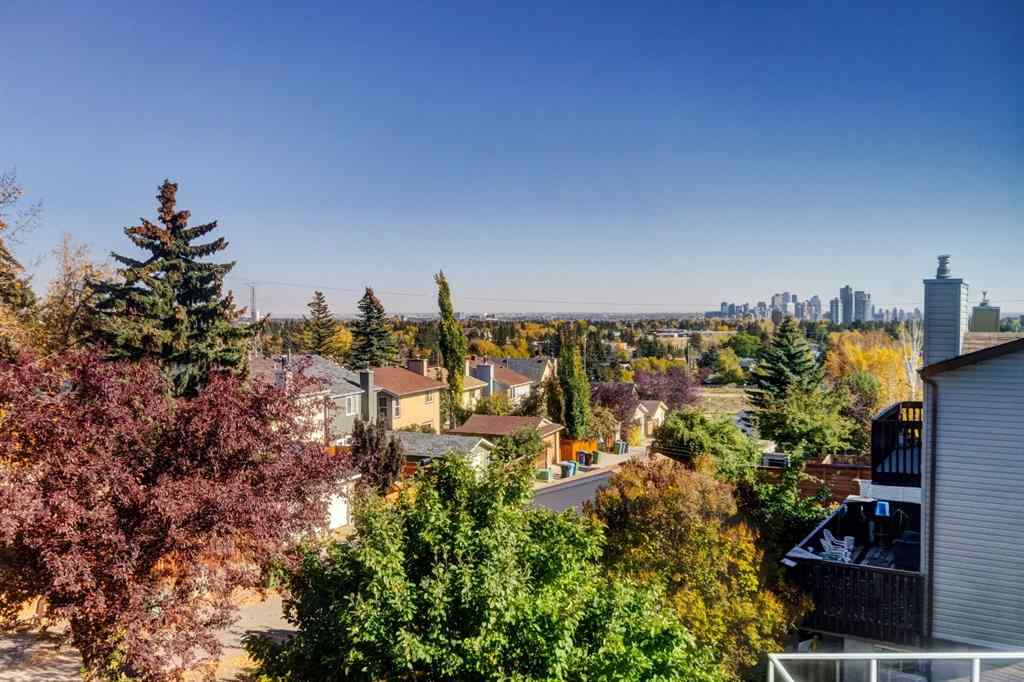 MLS® A2269029 - 235 Strathearn Crescent SW in Strathcona Park Calgary, Residential