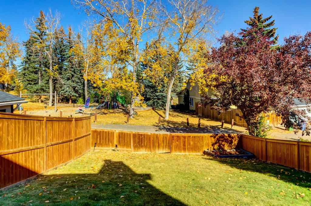 MLS® A2269029 - 235 Strathearn Crescent SW in Strathcona Park Calgary, Residential