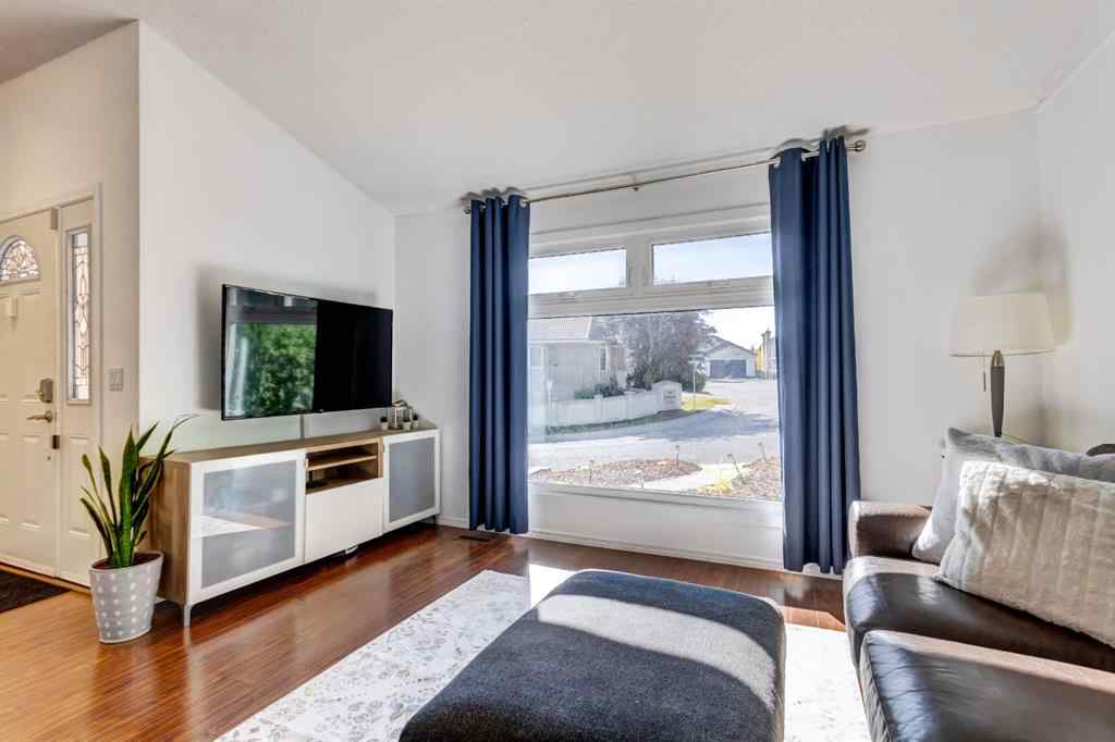 MLS® A2269029 - 235 Strathearn Crescent SW in Strathcona Park Calgary, Residential