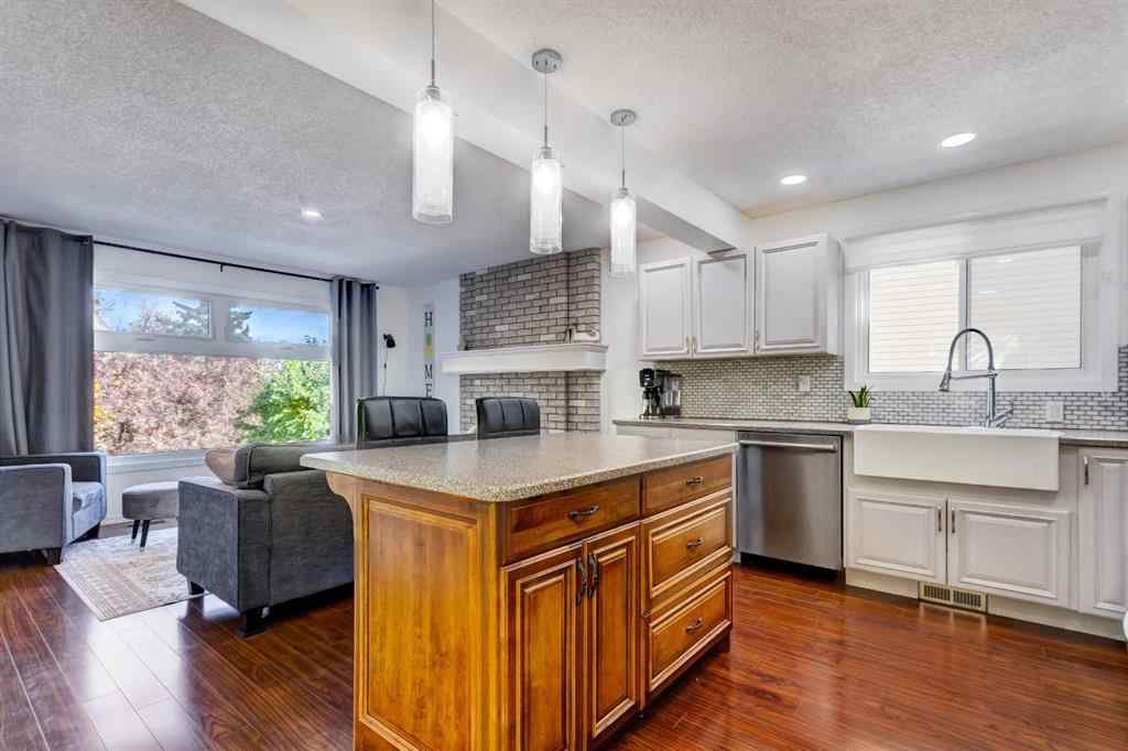 MLS® A2269029 - 235 Strathearn Crescent SW in Strathcona Park Calgary, Residential