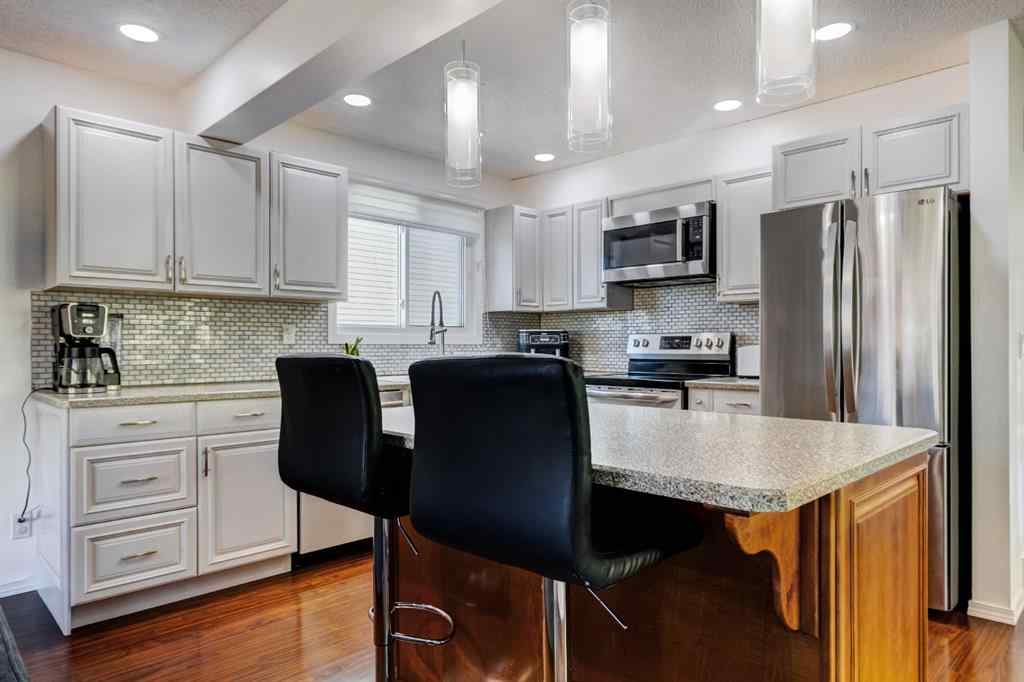 MLS® A2269029 - 235 Strathearn Crescent SW in Strathcona Park Calgary, Residential