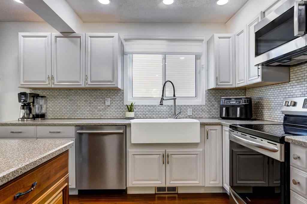 MLS® A2269029 - 235 Strathearn Crescent SW in Strathcona Park Calgary, Residential