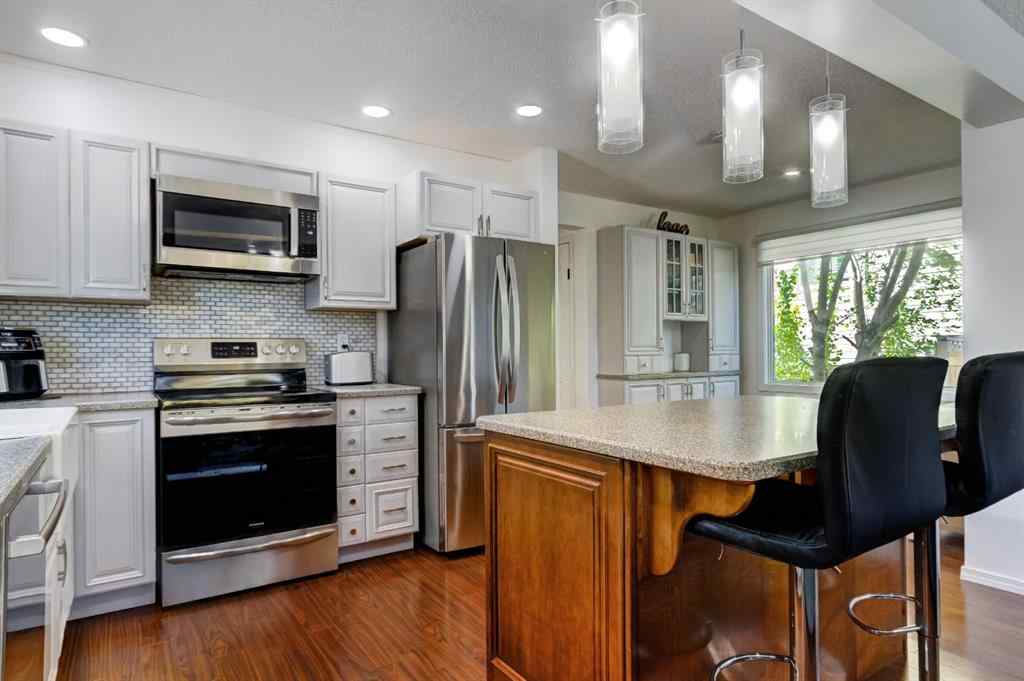 MLS® A2269029 - 235 Strathearn Crescent SW in Strathcona Park Calgary, Residential